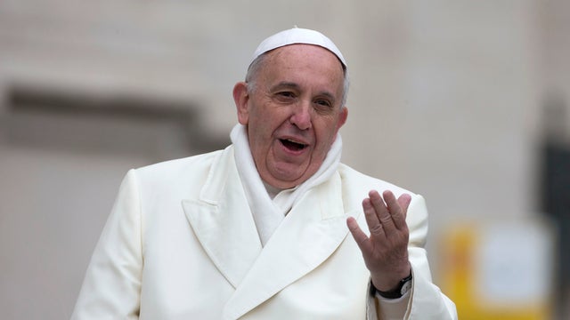 Pope Francis arrives on his pope-moblie for his weekly general audience in St. Peter's Square at the Vatican 