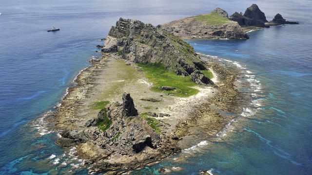 A Japanese survey ship sails around the tiny islands in the East China Sea called Senkaku in Japanese and Diaoyu in Chinese 