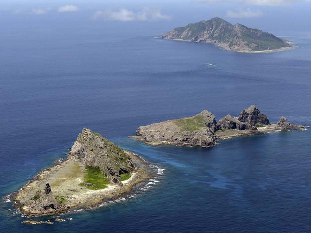 A group of disputed islands, Uotsuri island (top), Minamikojima (bottom) and Kitakojima, known as Senkaku in Japan and Diaoyu in China is seen in the East China Sea. 