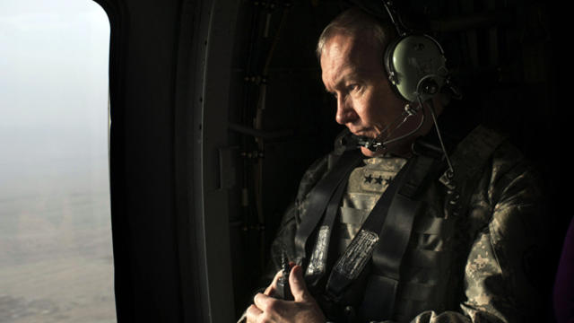 Joint Chiefs Chairman Gen. Martin E. Dempsey flies in a UH-60 helicopter from Forward Operating Base Frontenac to Kandahar, Afghanistan, Dec. 9, 2013, in this picture provided by the U.S. Department of Defense. 