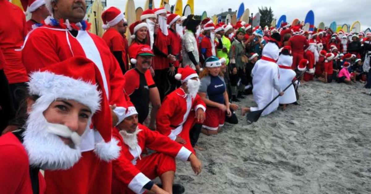 Surf's up for Santas in Florida - CBS News