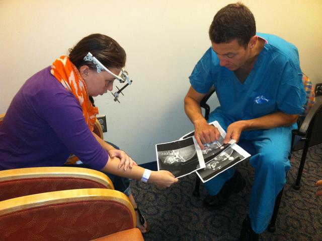 Examining Images at Follow Up visit 6.28.JPG 