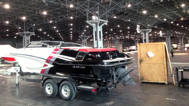 A boat arrives inside the Javits Center for the 2014 New York Boat Show 