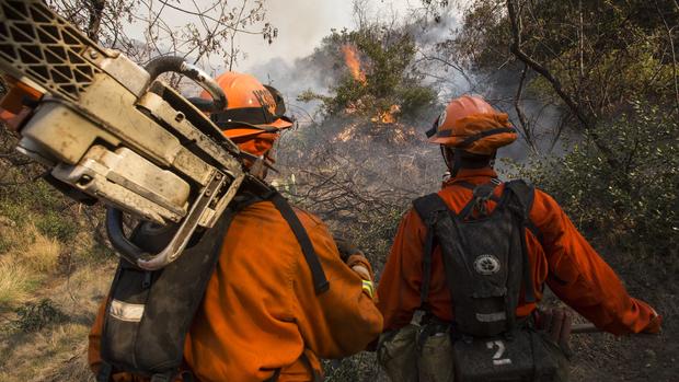 Wildfires burn through California 