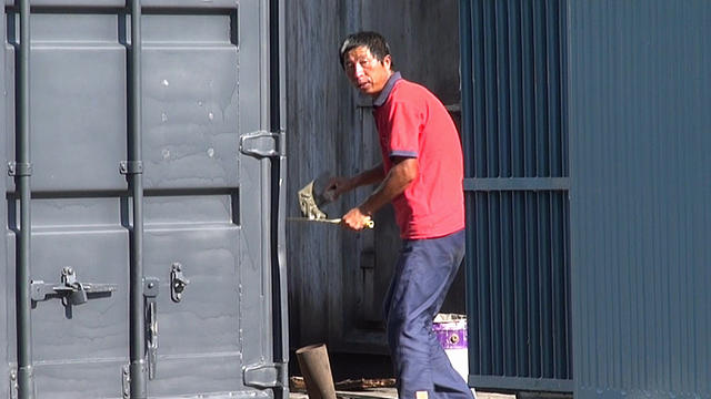 A Chinese construction worker helps build a new power plant on Grand Comore 