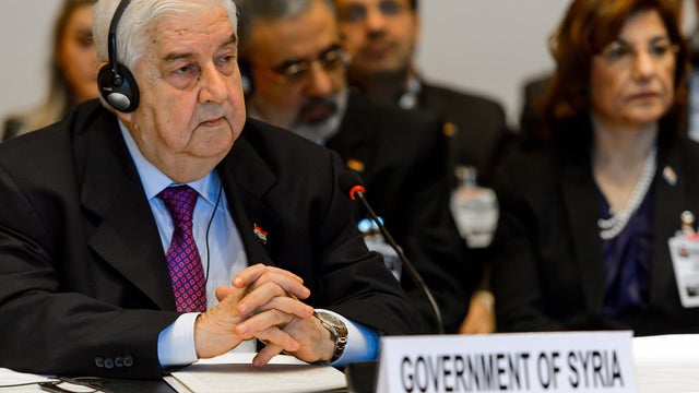 Syrian Foreign Minister Walid Muallem takes part in the so-called Geneva II peace talks  