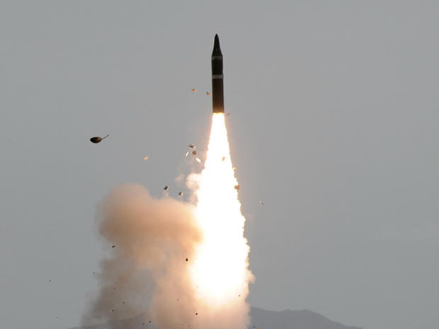 In a photo released by China's People's Liberation Army, a Dongfeng-31 international ballistic missile is test launched 