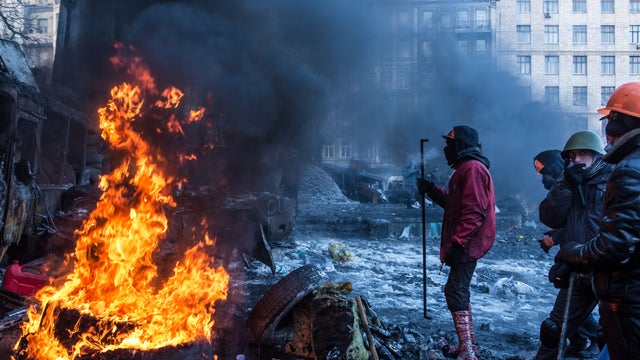 Anti-government protesters set fire to tires near Dynamo Stadium, Jan. 24, 2014 in Kiev 