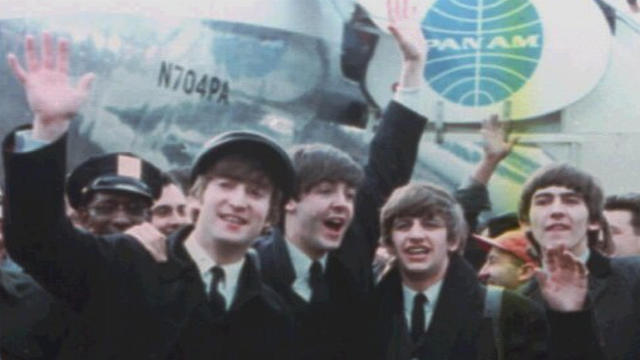 the-beatles-arrive-at-jfk-airport-1964.jpg 