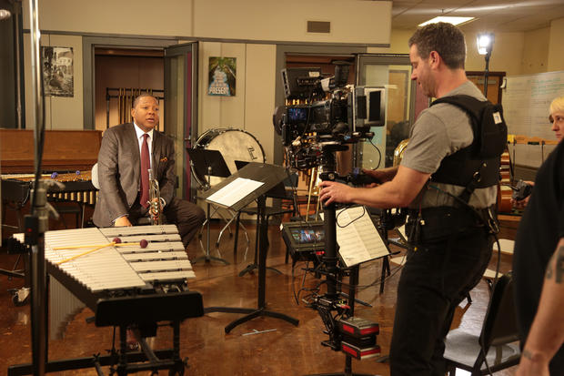 Wynton Marsalis reads his lines while the Stedicam operator Jeff Muhlstock gets the shot. 