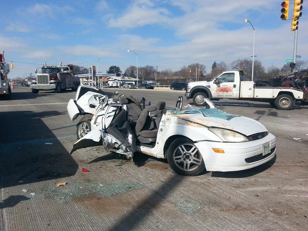Car Crushed Under Semi 