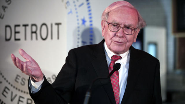 Warren Buffett, chairman and CEO of Berkshire Hathaway, speaks during a press conference Nov. 26, 2013, at Ford Field in Detroit. 