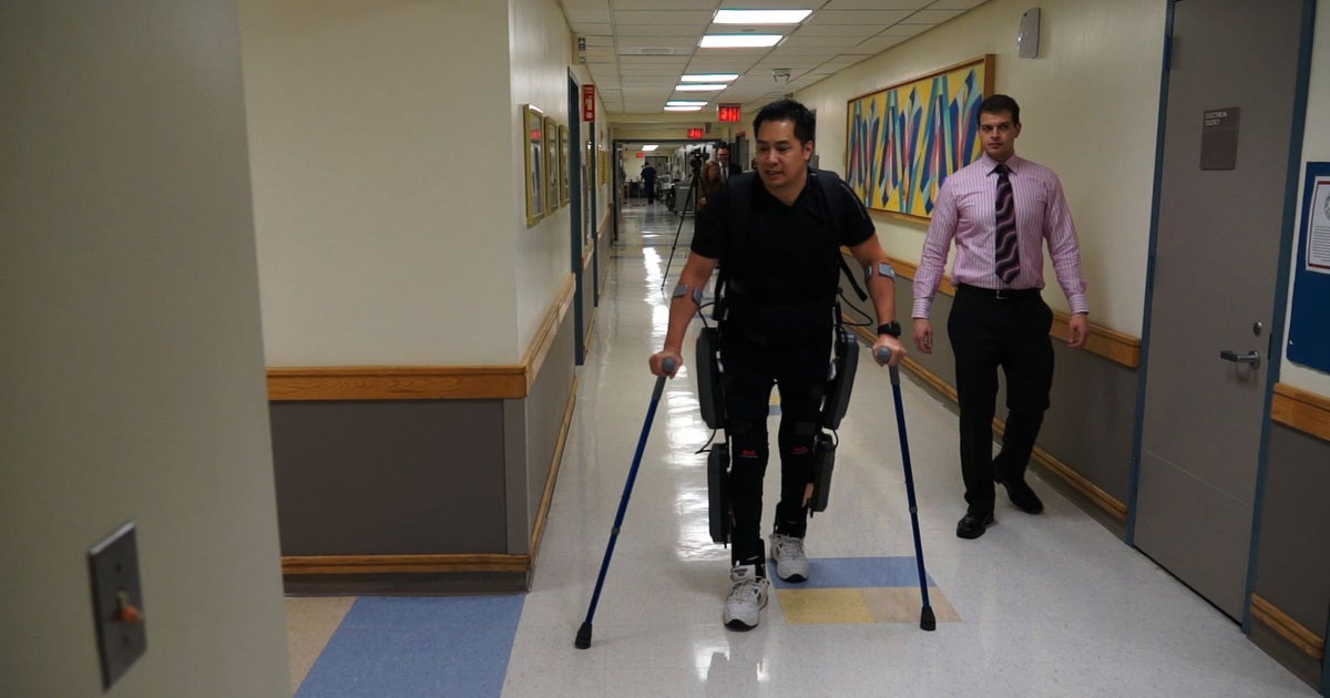 Paralyzed patients hope ReWalk exoskeleton gets approved by FDA - CBS News