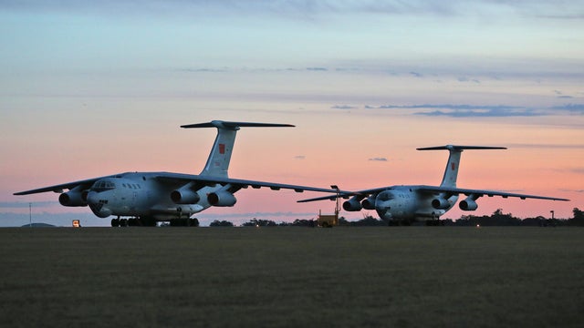 Two Chinese Ilyushin IL-76s aircraft sit on the tarmac at RAAF Pearce base ready to join the search missing Malaysia Airlines flight MH370 