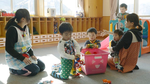 Toddlers play at a nursery school in Tamura, Fukushima Prefecture, northeastern Japan, April 1, 2014 