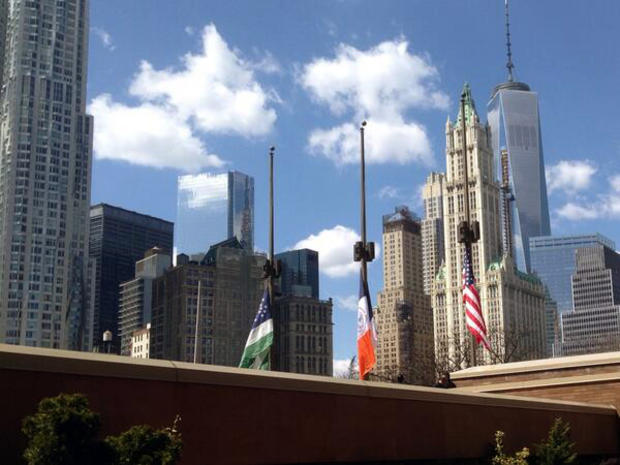 Flags lowered to half staff outside One Police Plaza in honor of fallen officer Dennis Guerra 