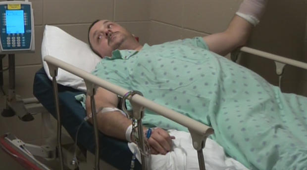 Rodney Denk questioned by police from his hospital bed 