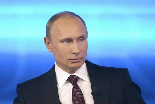 Russian President Vladimir Putin takes part in a live nationwide phone-in broadcast 