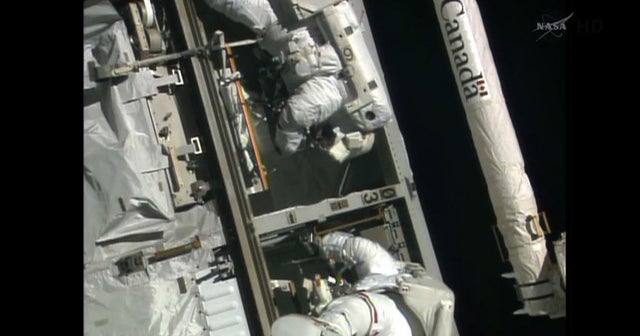 Astronauts complete spacewalk, fix computer - CBS News
