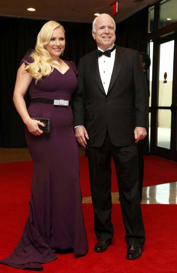 Meghan McCain and her father, Sen. John McCain, R-Ariz., arrive on the red carpet at the annual White House Correspondents' Association dinner in Washington May 3, 2014. 