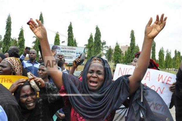 An unidentified mother cries out during a demonstration with others who have daughters among the kidnapped school girls of government secondary school Chibok 