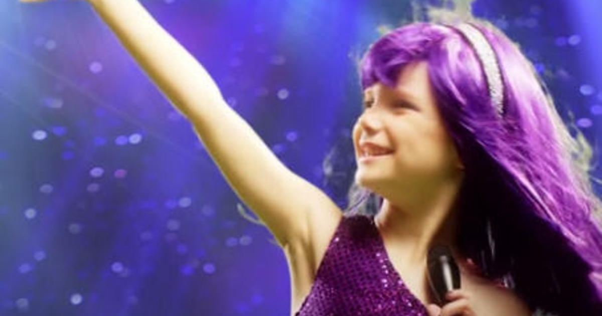 Girl who beat cancer “roars” into her own Katy Perry-style music video -  CBS News