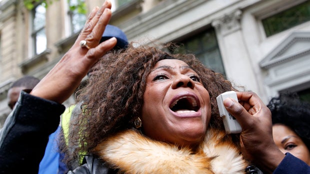 A protester demonstrates against the kidnapping of school girls in Nigeria outside the Nigerian Embassy in London May 9, 2014. 