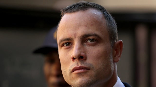Oscar Pistorius leaves North Gauteng High Court after the judge ordered that he should undergo mental evaluation May 14, 2014, in Pretoria, South Africa. 