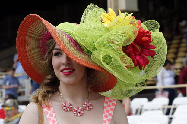 Audra Harris wears a hat before the 139th Preakness Stakes at Pimlico Race Course in Baltimore May 17, 2014. 