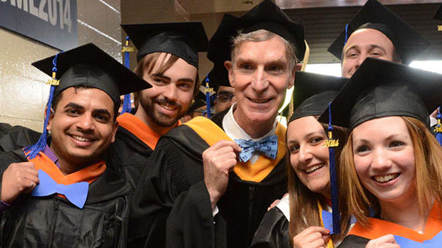 Bill-Nye-with-bowtie-clad-UMass-Lowell-graduates 