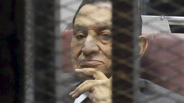 Egypt's ousted President Hosni Mubarak inside a dock 