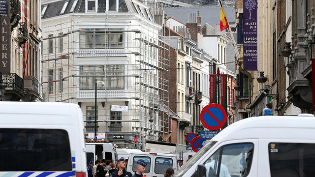 Policemen close the access of the scene of a shooting near the Jewish Museum in Brussels May 24, 2014. 