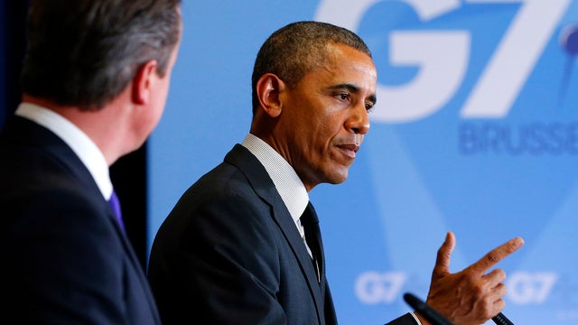 British Prime Minister David Cameron and President Obama hold a joint news conference at the end of a G7 leaders meeting at European Council headquarters in Brussels June 5, 2014. 