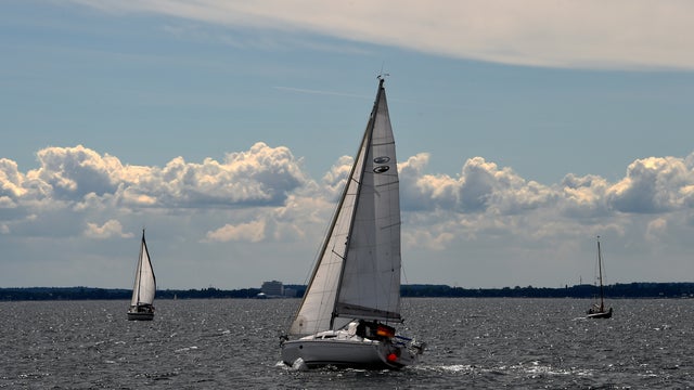 Boats sail on the Baltic Sea near Neustadt, northern Germany on June 17, 2014. 