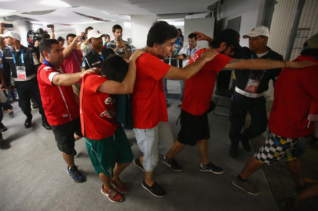 Fans storm stadium in Brazil 