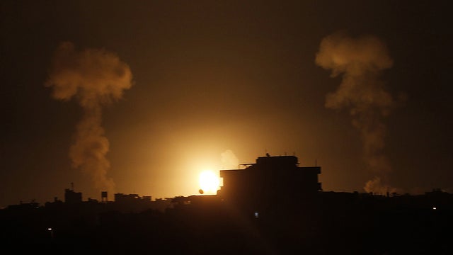A ball of fire is seen following an Israeli airstrike in Rafah, in the southern Gaza Strip 