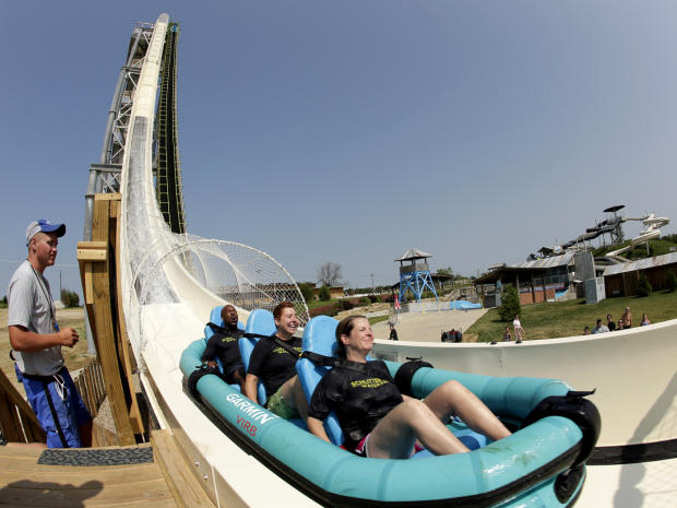 Riders go down the world's tallest waterslide, called "Verruckt," at Schlitterbahn Waterpark July 9, 2014, in Kansas City, Kan., in this picture taken with a fisheye lens. 