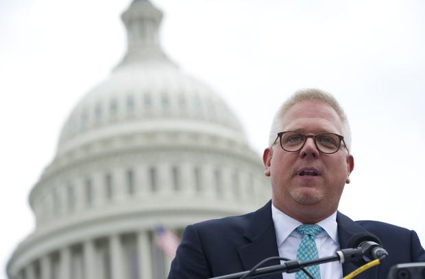 Conservative radio and television commentator Glenn Beck speaks to a rally of tea party members as they protest against the Internal Revenue Service's targeting of the tea party and similar groups during a rally called "Audit the IRS" outside the U.S. Cap 