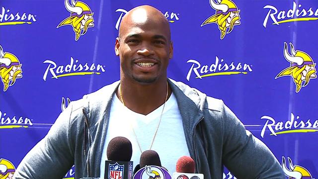 adrian-peterson-arrives-at-training-camp.jpg 