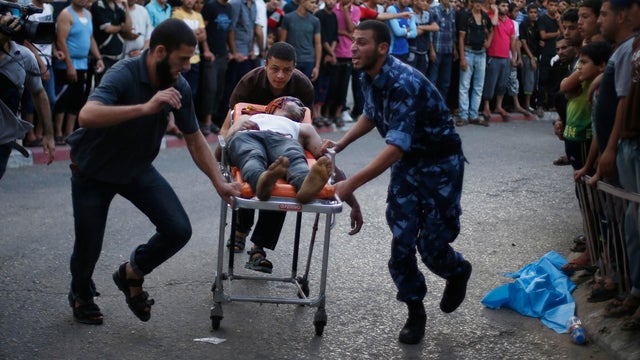 2014-07-30t165124z1475178573gm1ea7v02ar01rtrmadp3mideast-gaza-market.jpg 