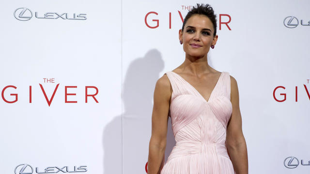 Actress Katie Holmes attends the premiere of "The Giver" in New York Aug. 11, 2014. 