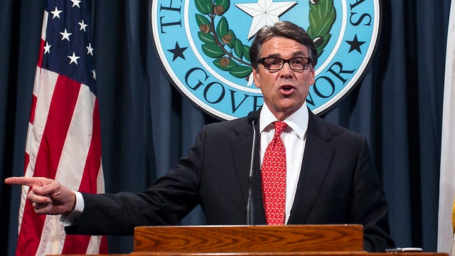 Texas Gov. Rick Perry denounces felony charges by a Travis County grand jury during a press conference at the State Capitol in Austin, Texas, Aug. 16, 2014. 
