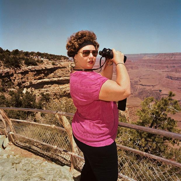 woman-with-binoculars-at-south-rim-grand-canyon-national-park-az-1980-e1336769644857.jpg 