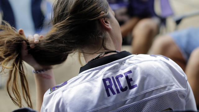 Baltimore Ravens fans wearing Ray Rice jerseys