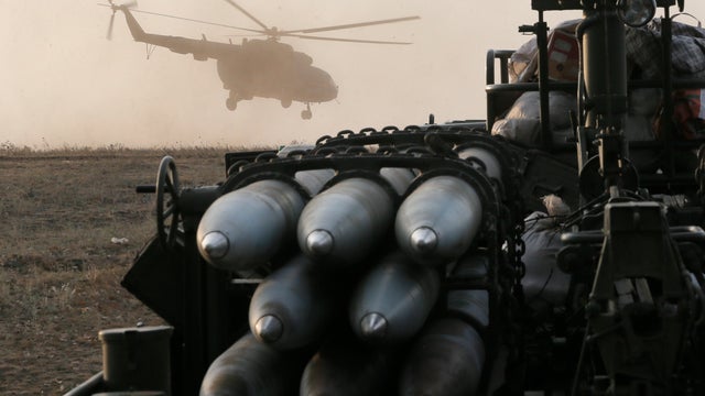 A Ukrainian army helicopter flies over army positions in Debaltsevo, Donetsk region 