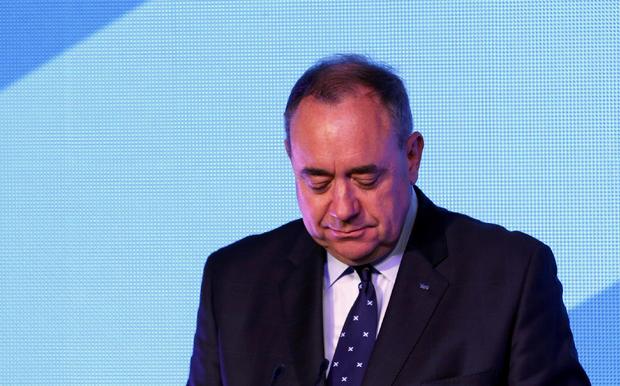 Scotland's First Minister Alec Salmond reacts as he concedes defeat in the independence referendum at the "Yes" Campaign headquarters in Edinburgh 