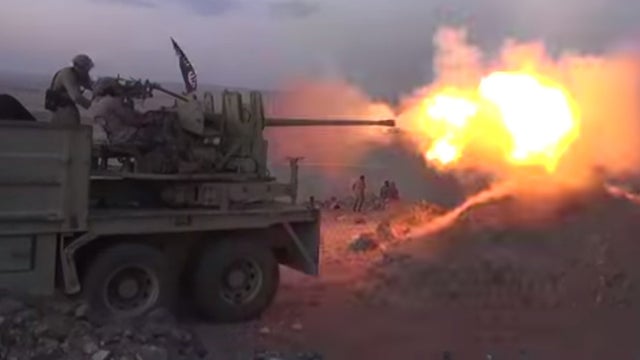  ISIS militants engaged in fighting with Kurdish forces near the northern Syrian city of Kobani 