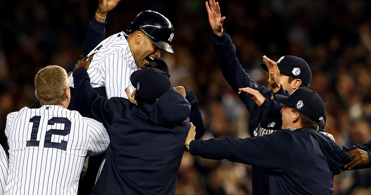 New York Yankees Alex Rodriguez and Derek Jeter react holding the MLB World  Series Trophy after the game against the Philadelphia Phillies in game 6 of  the World Series at Yankee Stadium