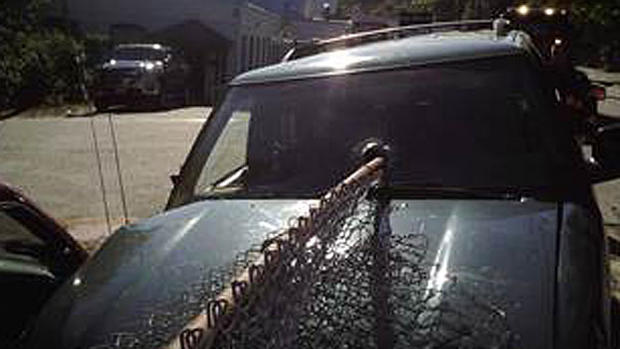Fitchburg-exterior-pole-through-windshield 