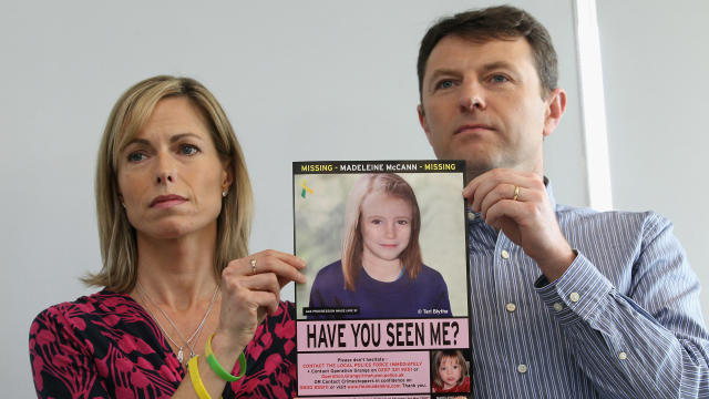 Kate and Gerry McCann hold an age-progressed police image of their daughter during a news conference to mark the 5th anniversary of the disappearance of Madeleine McCann 